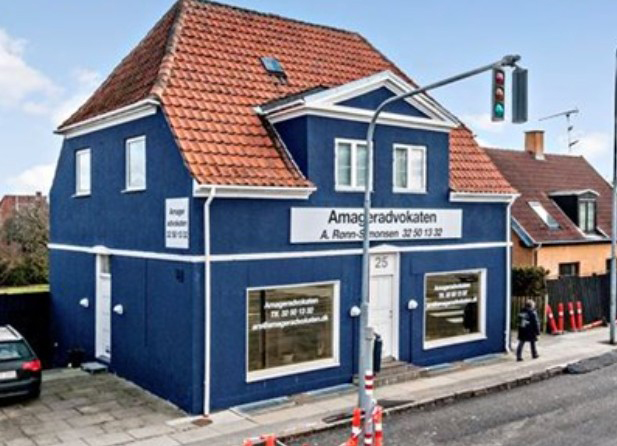 Blue House Copenhagen facade with Amageradvokaten signage on Amager Landevej 25