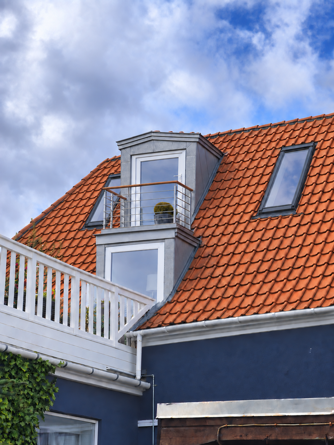 The same possible conversion seen obliquely from the garden, with a dormer balcony above the existing terrace exit.